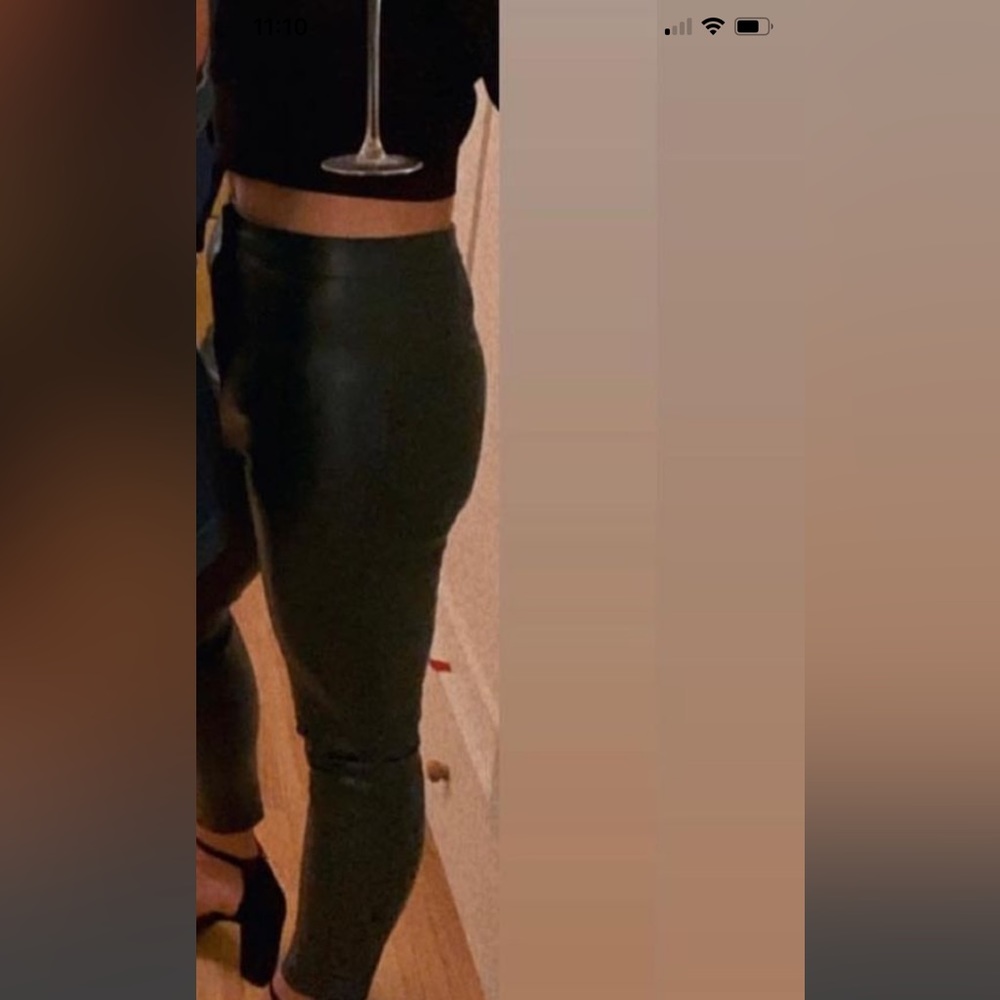 Green leather trousers